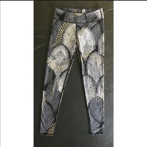 FABLETICS BLACK WHITE AND GOLD PRINT LEGGINGS